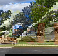 The Fossilised Forest Sculpture - Accommodation Yamba