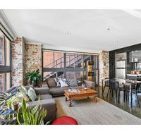 Chic warehouse apartment in hipster foodie hub - Accommodation Yamba