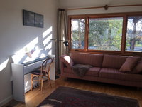 Eco-renovated light-filled house on a hill