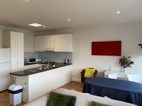 Soaking Up The Sun In BlackRock - Accommodation Yamba 1