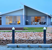The Carnarvon Luxury Canal Home - Accommodation Yamba