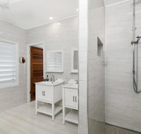 Bathers across the bay from Port Douglas - Accommodation Yamba